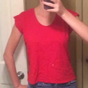 Red sleeveless blouse